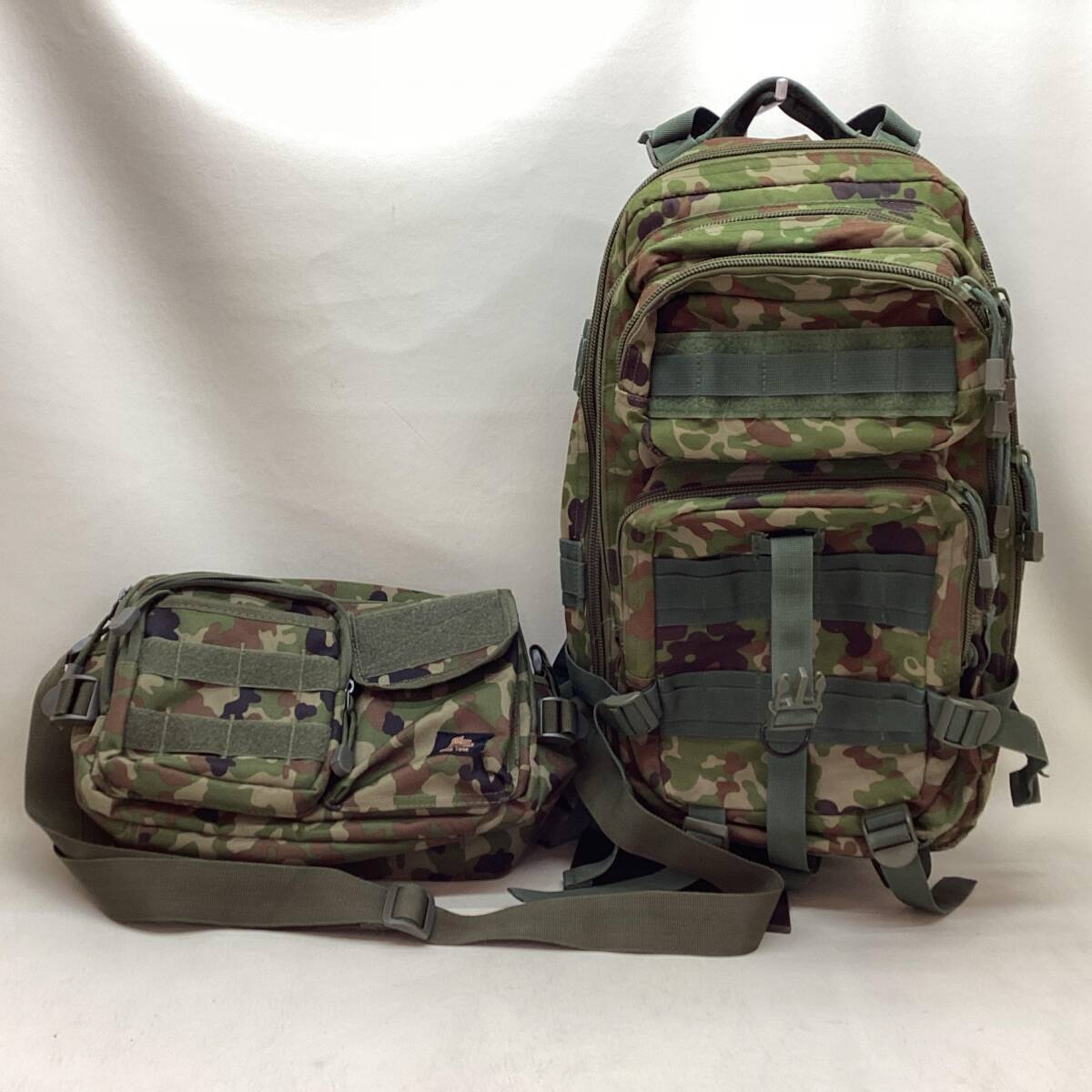 ■STORMCROS ストームクロス ウエストバッグ 他 迷彩柄バッグ 2個セット ウエストバッグ リュック 中古品 1.67kg