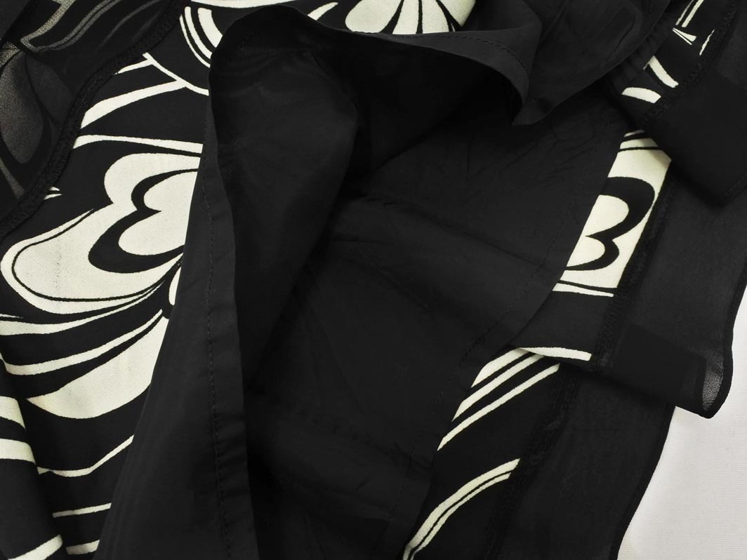 ネコポスOK NATURAL BEAUTY ナチュラルビューティー 総柄 フレア Aライン 臺形 スカート sizeM/白ｘ黒 ■◇ ☆ fac8 レディース