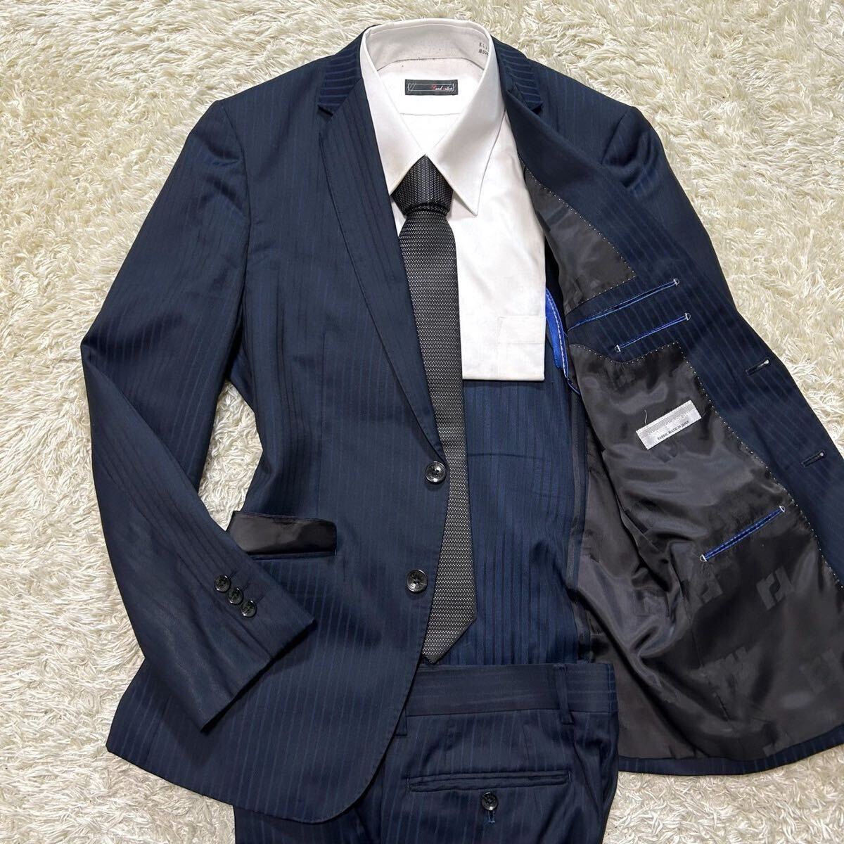 レノマオム【人気の好配色】renoma HOMME スーツ　セットアップ　テーラードジャケット　ストライプ　ロゴ総柄　ネイビー　S〜M位