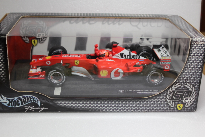 限定シリアル入り　1/18 HotWheels FERRARI F2002 Michael Schumacher 150勝 カナダGP マルボロ仕様(ミハエル・シューマッハ フェラーリ）
