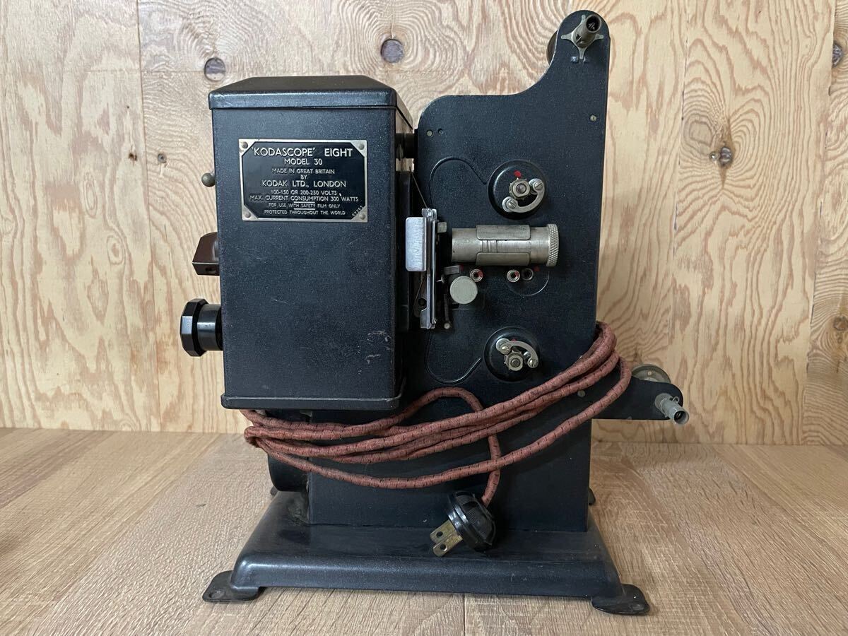 昭和レトロ　アンティーク　家庭用手動式映写機 と フィルム 昭和レトロ アンティーク 家庭用手動式映写機 と フィルム