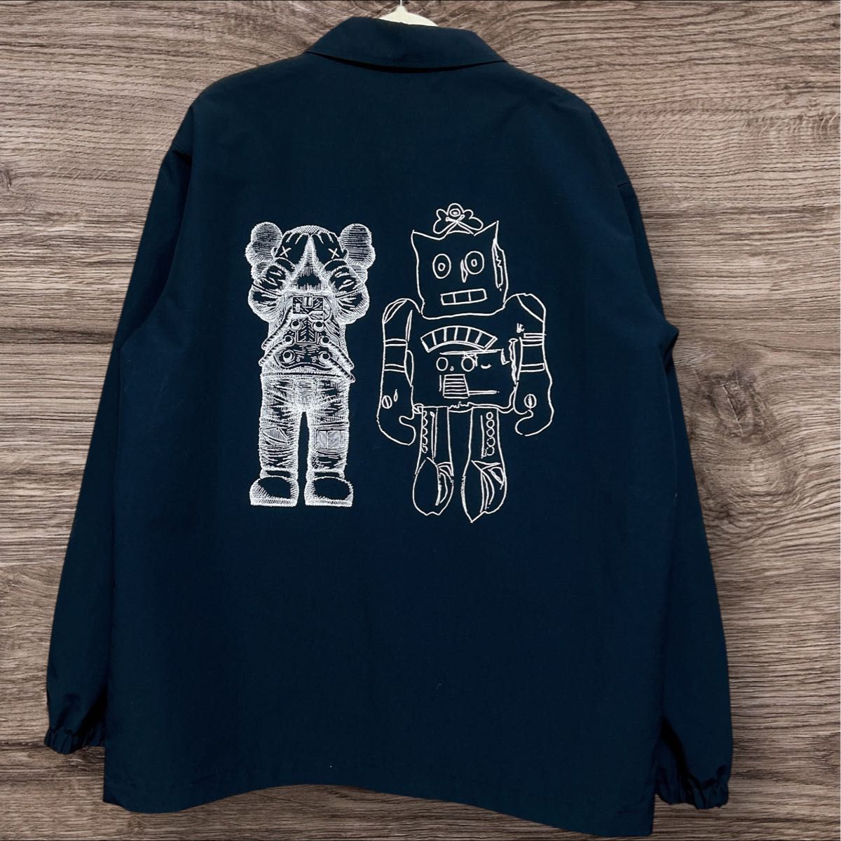 美品 ユニクロ カウズ×ウォーホル コーチジャケット ネイビー 美品 ユニクロ カウズ×ウォーホル コーチジャケット ネイビー