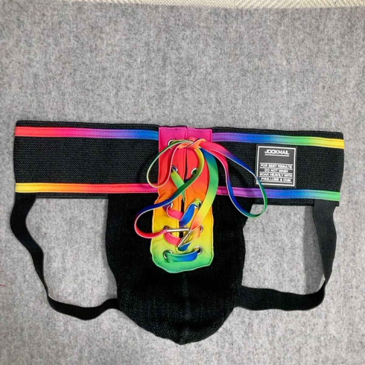 【JOCKMAIL】ジョックストラップ(ケツワレ) レインボー ブラック 前面開口 紐付き Mサイズ