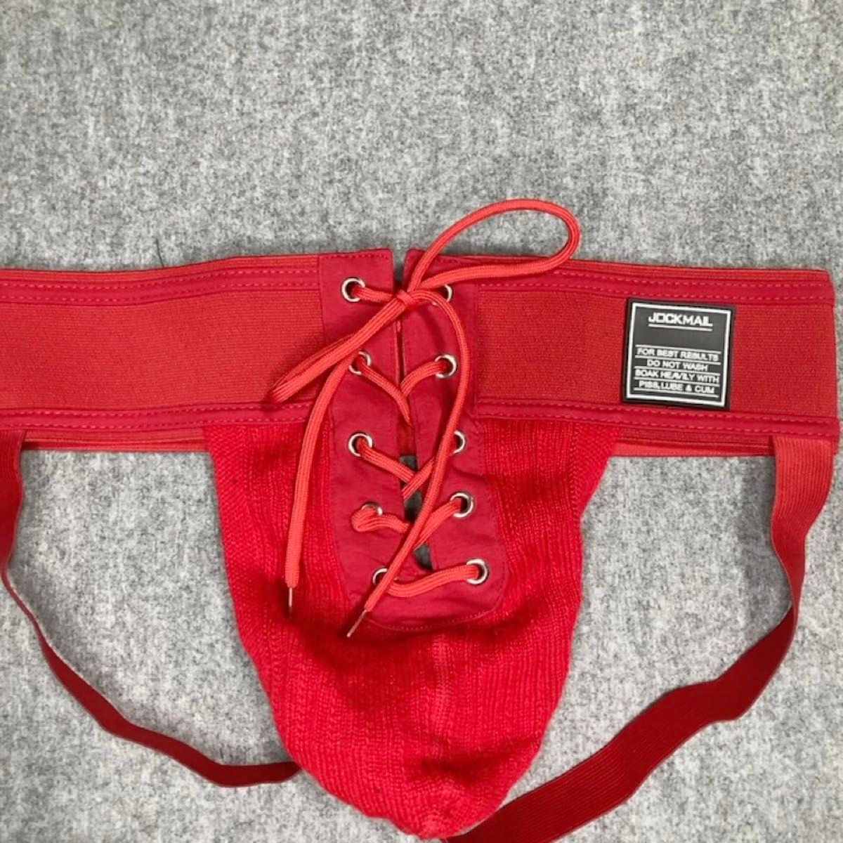 【JOCKMAIL】ジョックストラップ(ケツワレ) レッド 前面開口 スニーカーライク デザイン 紐付き Mサイズ