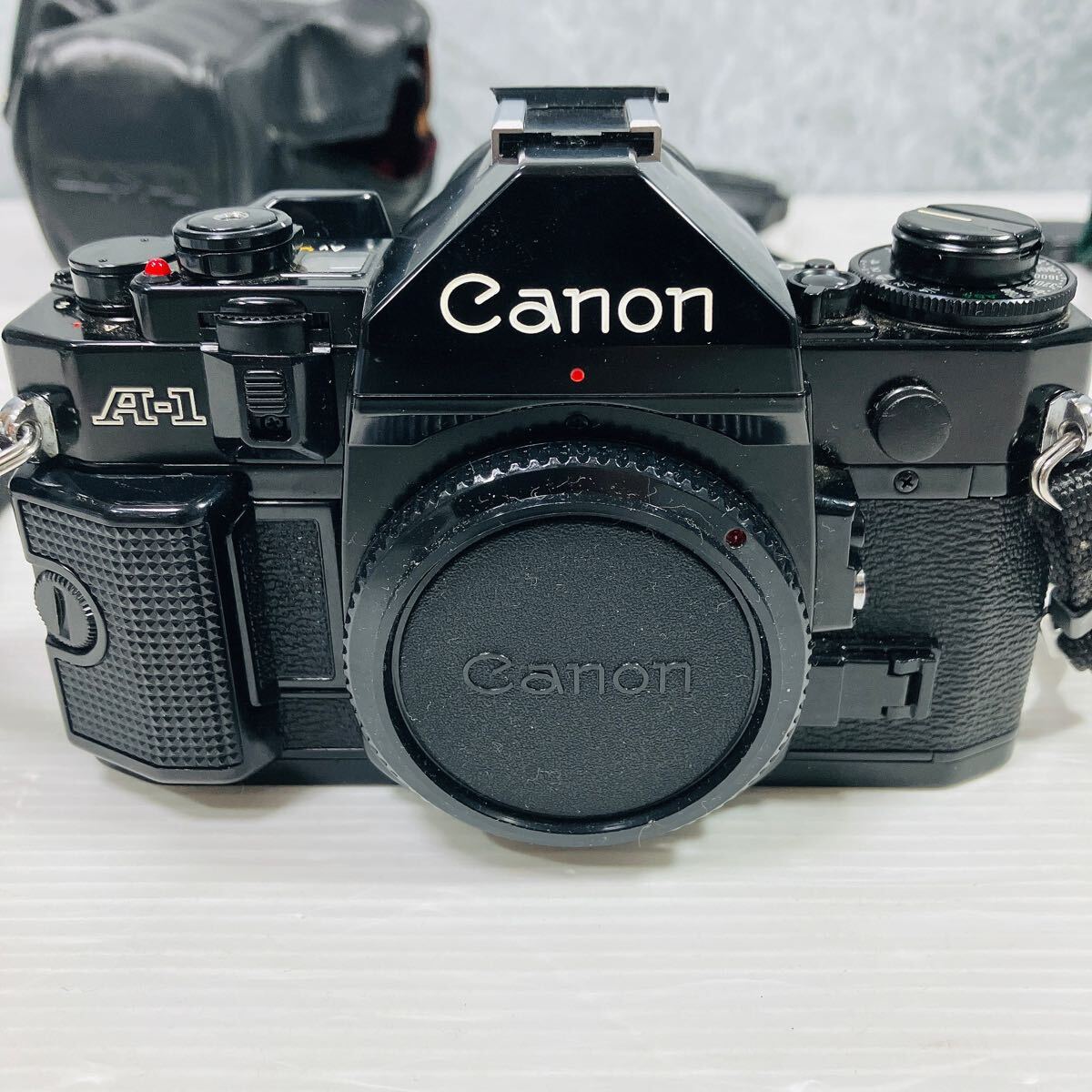 名機 CANON A-1 一眼レフ フィルムカメラ 外観美品 +レンズ2本 名機 CANON A-1 一眼レフ フィルムカメラ 外観美品 +レンズ2本