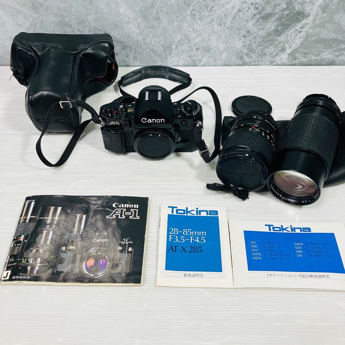 名機 CANON A-1 一眼レフ フィルムカメラ 外観美品 +レンズ2本 名機 CANON A-1 一眼レフ フィルムカメラ 外観美品 +レンズ2本