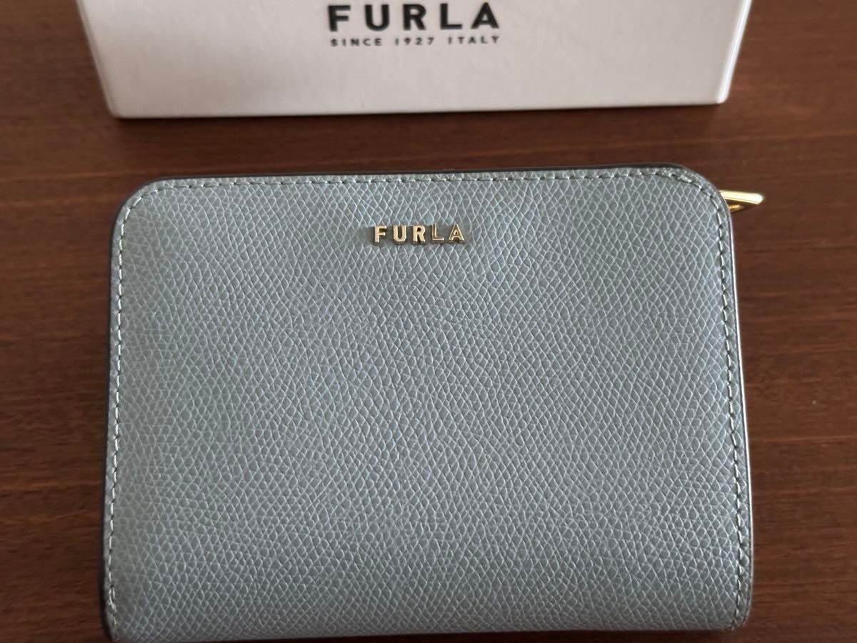 最終値下げ フルラ FURLA 二つ折り財布 水色 内側デザイン幸運の 最終値下げ フルラ FURLA 二つ折り財布 水色 内側デザイン幸運の