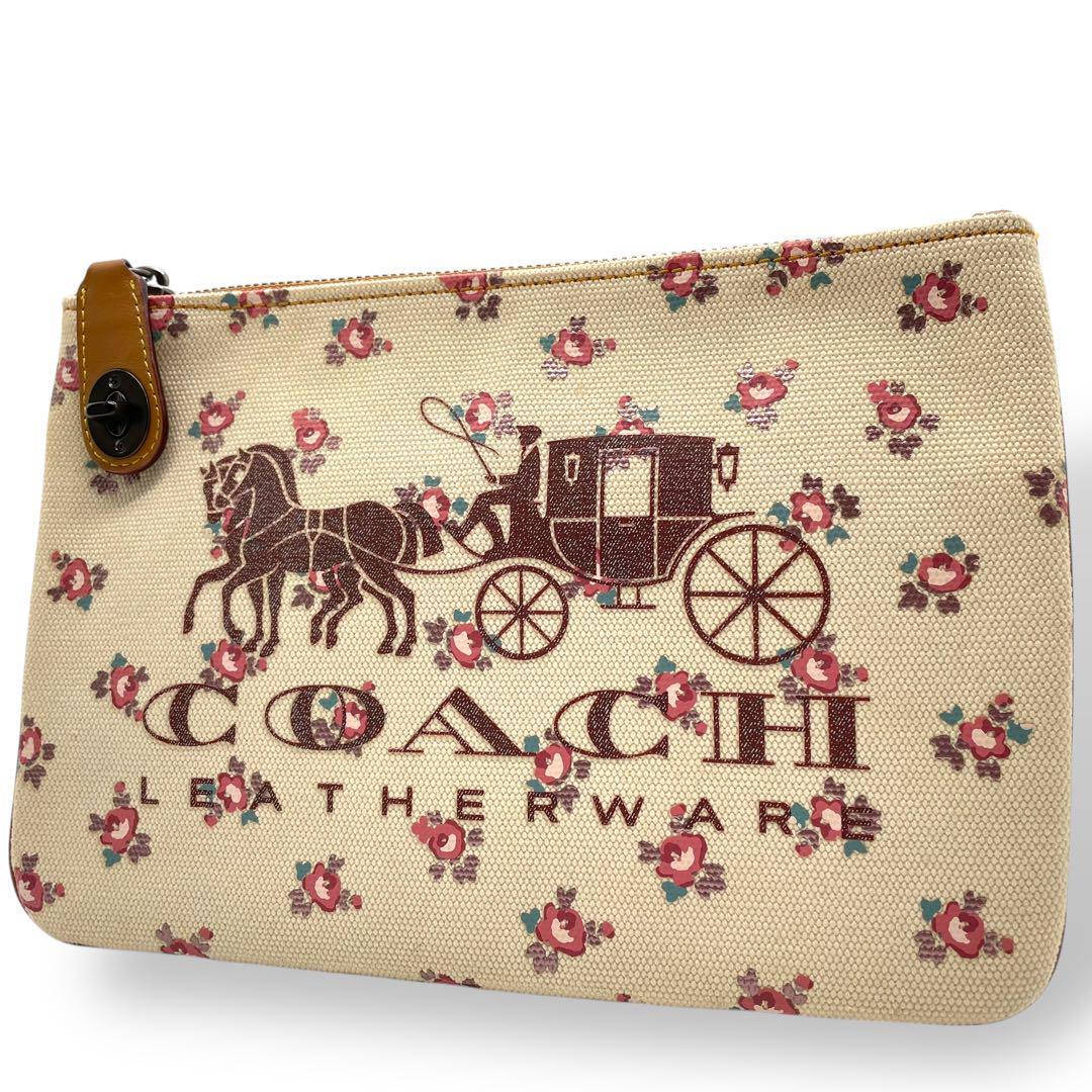 極美品 COACH コーチ レア クラッチバッグ ターンロック 馬車ロゴ