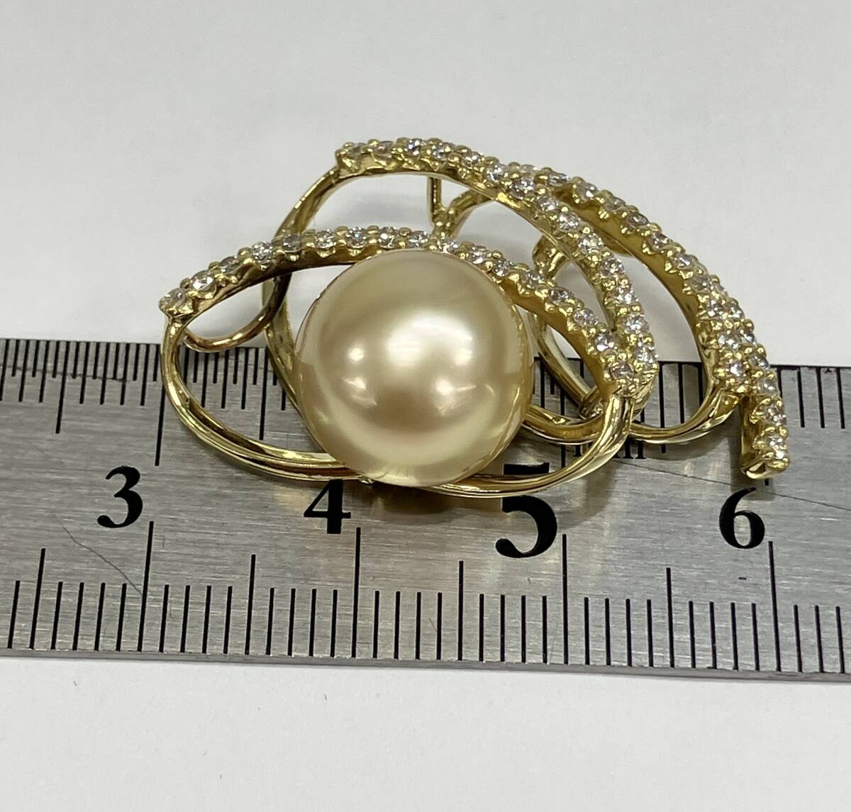 K18 юг . жемчуг натуральный бриллиант 0.61ct верх 