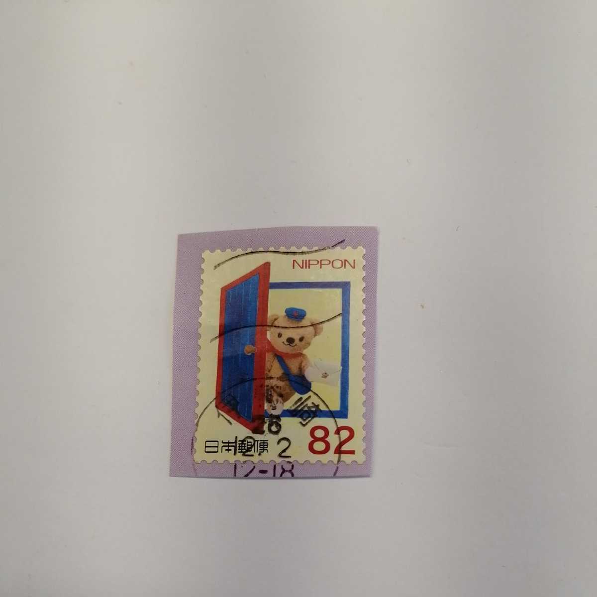 使用済み切手　満月印　伊勢崎２　秋のグリーティング　平成２６年９月５日発行　ドアからぽすくま　_画像1