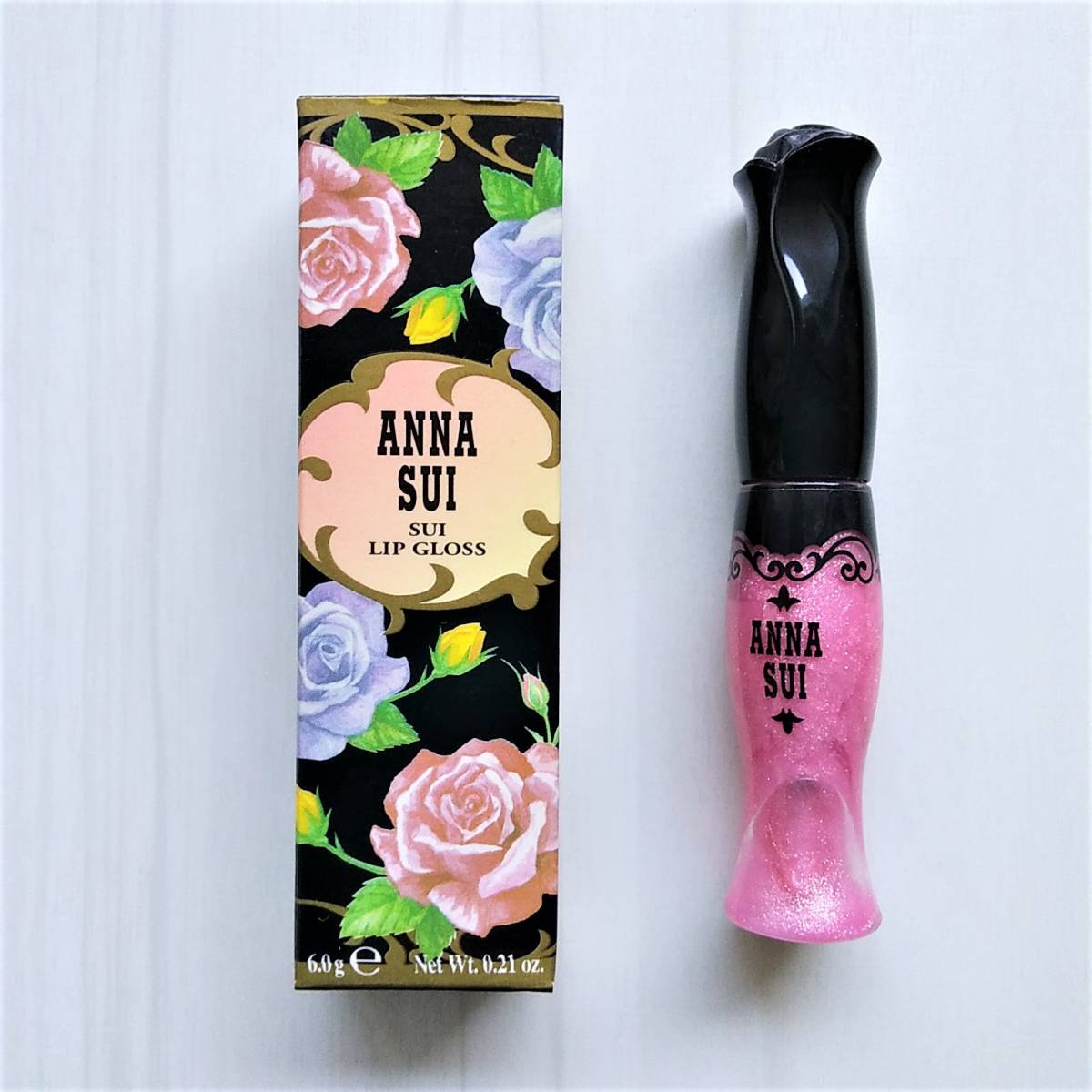 新品★未使用★アナスイ ANNA SUI リップグロス 303 口紅 ～きらりと、まぶしいほどに。 光がおどるみずみずしいくちびる。～_画像1