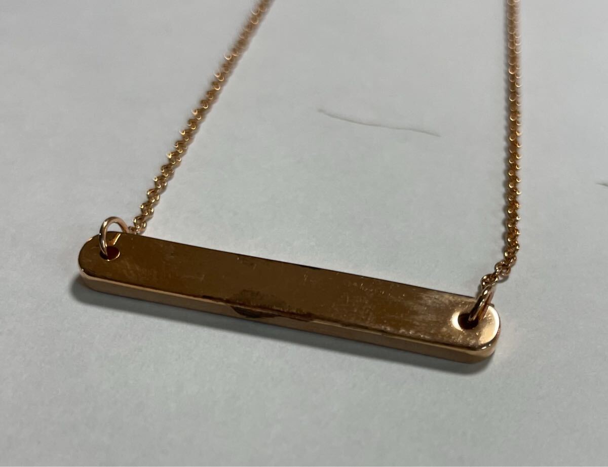 COACH メタル ロゴ プレート コーチ　ラインストーン　ネックレス　ホワイト　レディース　アクセサリー ペンダント