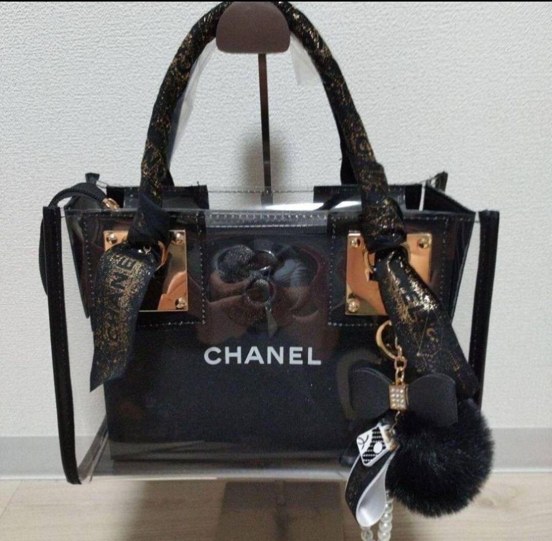シャネル CHANELショップ袋リボンチャーム限定カメリア付き新品 シャネル CHANELショップ袋リボンチャーム限定カメリア付き新品
