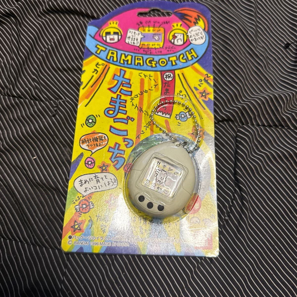 新品未開封 当時物 新種発見！！ たまごっち 初代 白×青 - メルカリ