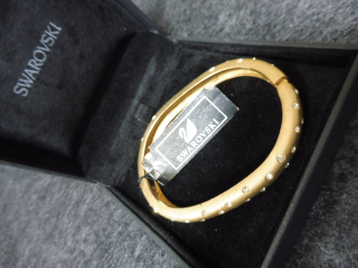 新品箱付 SWAROVSKI スワロフスキー ブレスレット バングル ゴールド系　(26_画像1