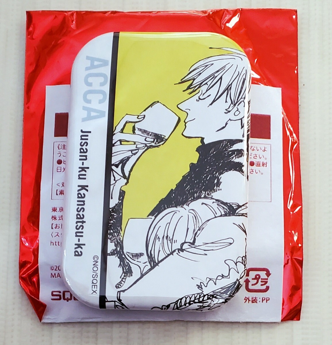 ACCA13区監察課 トレーディング スクエア 缶バッジ ニーノ 裏側 ACCA13区監察課 トレーディング スクエア 缶バッジ ニーノ 裏側