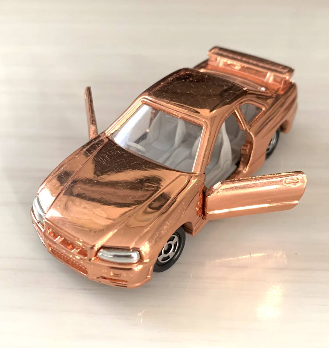 トミカ 日産スカイライン GT-R (R34) 銅メッキトミカ 株主優待 トミカ 日産スカイライン GT-R (R34) 銅メッキトミカ 株主優待