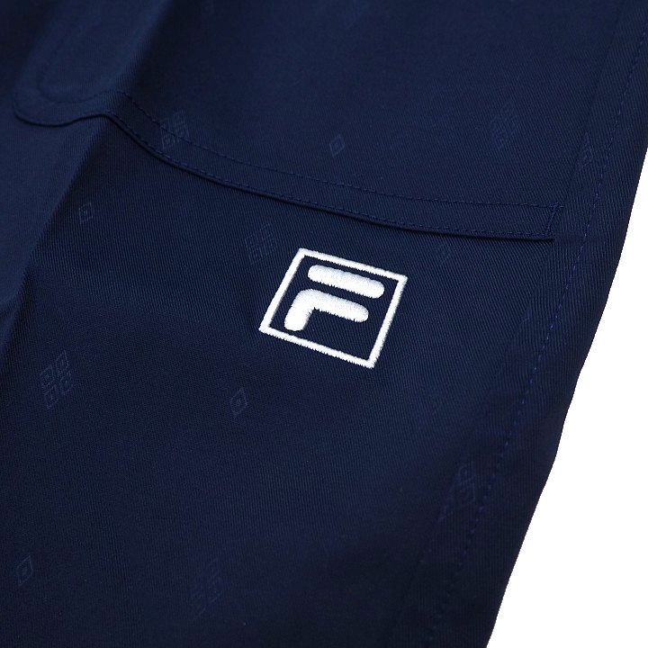 R744 新品 FILA GOLF フィラ ゴルフ ９分丈 テーパード パンツ ストレッチ エンボス総柄 Dカン ネイビー 90