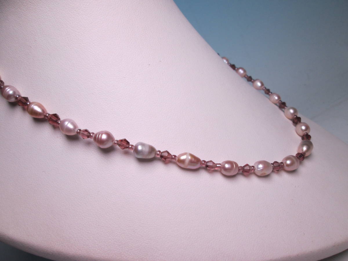 * fresh water pearl .& light purple glass. design necklace 