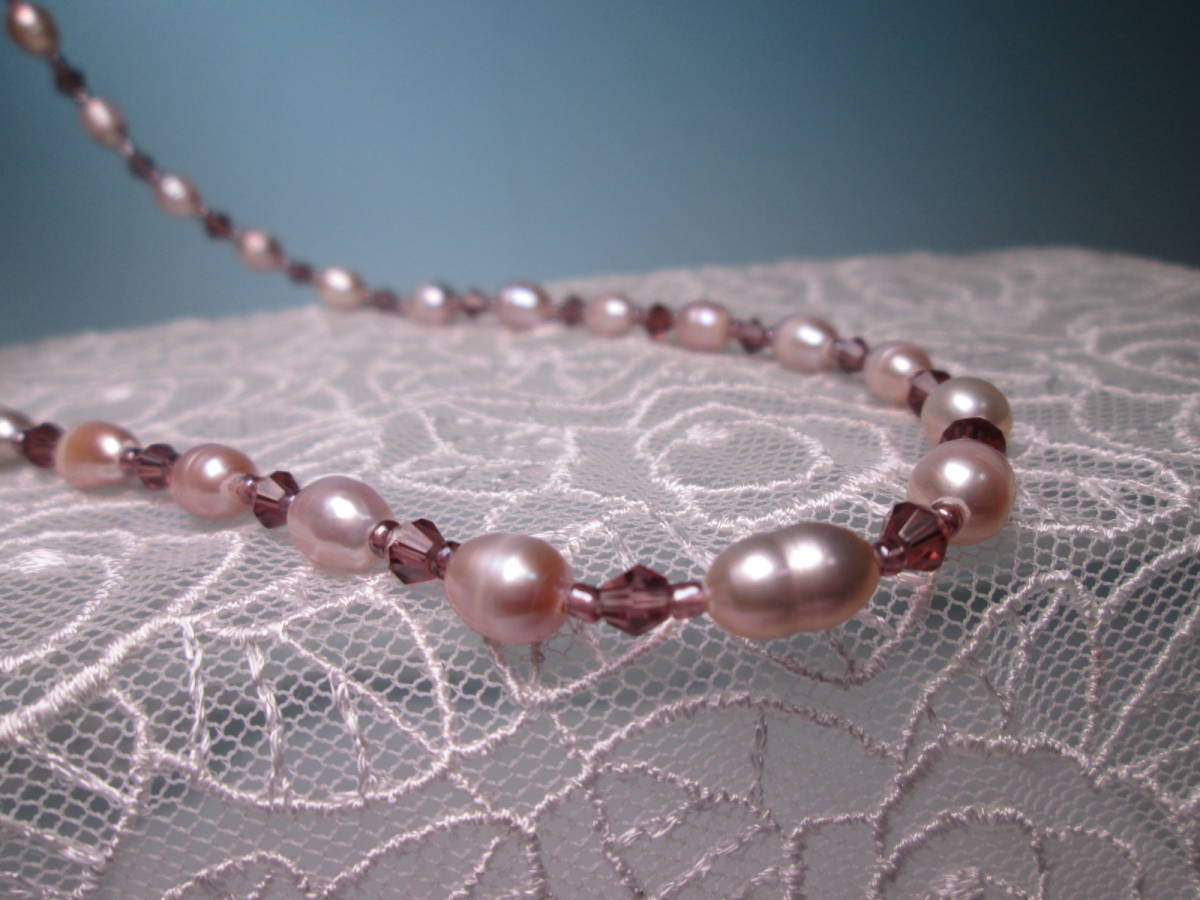 * fresh water pearl .& light purple glass. design necklace 