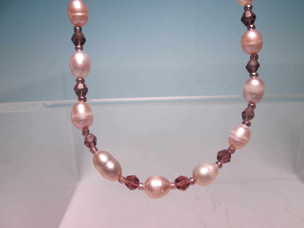 * fresh water pearl .& light purple glass. design necklace 