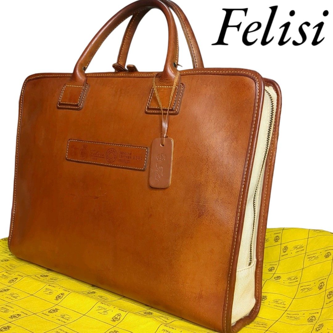 Felisi フェリージ オールレザー チャーム付 ブリーフケース Felisi フェリージ オールレザー チャーム付 ブリーフケース