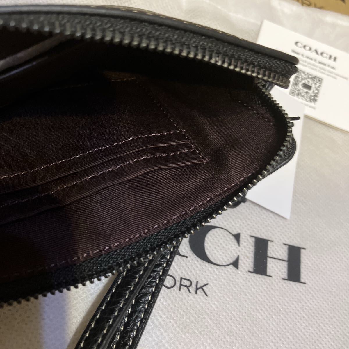 送料込●新品●COACH X ディズニー100周年コラボ ストラップ付きポーチ D 小物入 コーナーZIP ウィンクミッキー 2023年コラボ新作