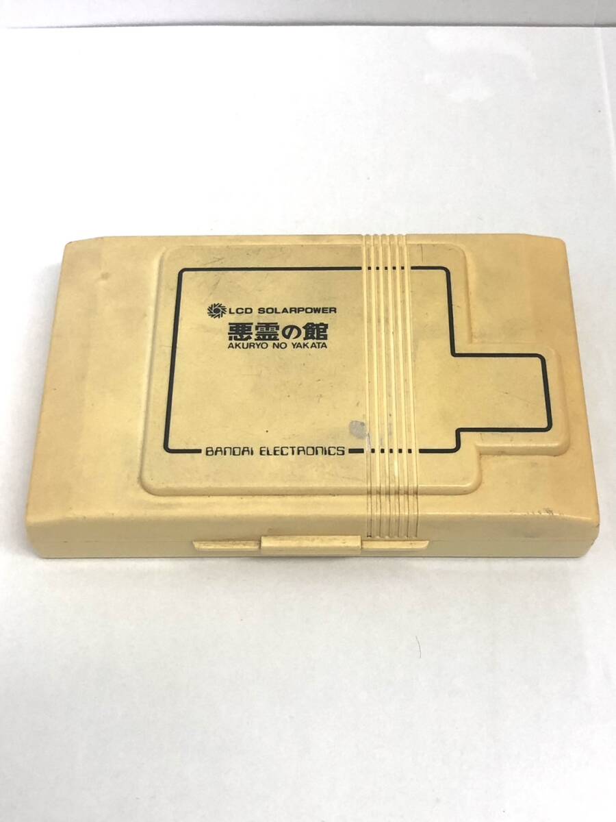 O4-104【BANDAI 悪霊の館 ダブルパネル 取説付 LCD ソーラー O4-104【BANDAI 悪霊の館 ダブルパネル 取説付 LCD ソーラー