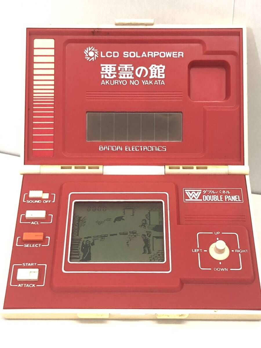 O4-104【BANDAI 悪霊の館 ダブルパネル 取説付 LCD ソーラー O4-104【BANDAI 悪霊の館 ダブルパネル 取説付 LCD ソーラー