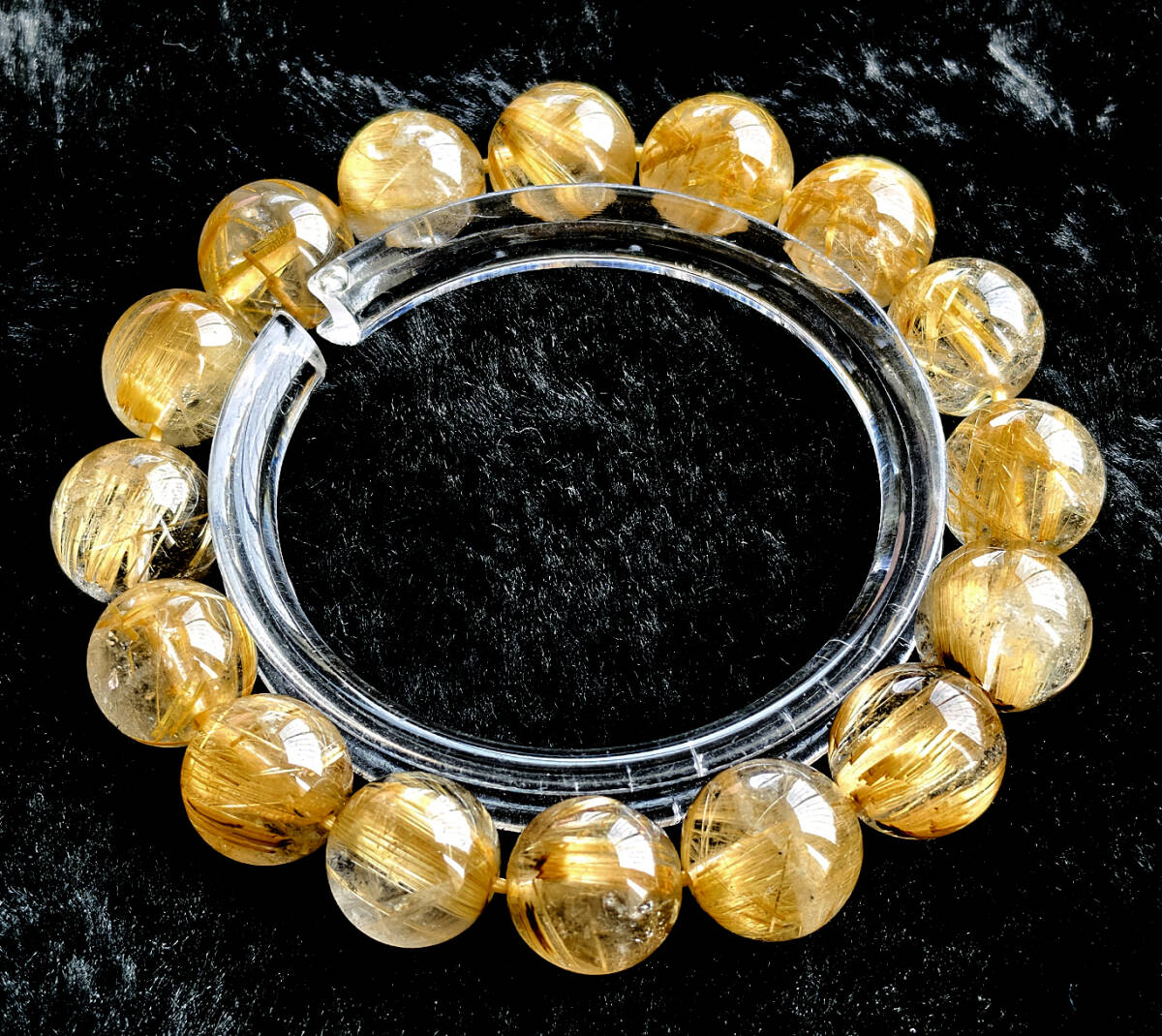 N00646◆Bigstone◆新品*1１.5mm*ブラジル産*美品【5Aゴールドタイチンルチル】天然石ブレス_画像1