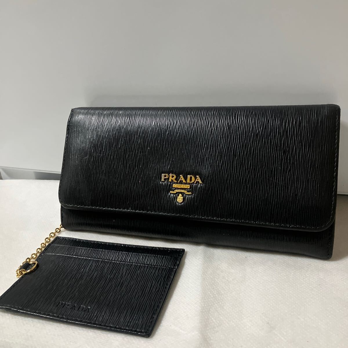 良品】 PRADA プラダ 長財布 サフィアーノレザー ブラック系 良品】 PRADA プラダ 長財布 サフィアーノレザー ブラック系