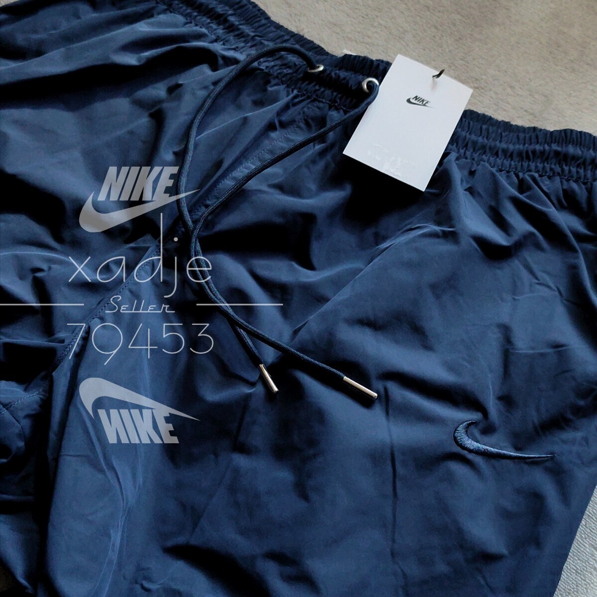 新品 正規品 NIKE ナイキ ビッグスウッシュ 上下セット ナイロン 新品 正規品 NIKE ナイキ ビッグスウッシュ 上下セット ナイロン