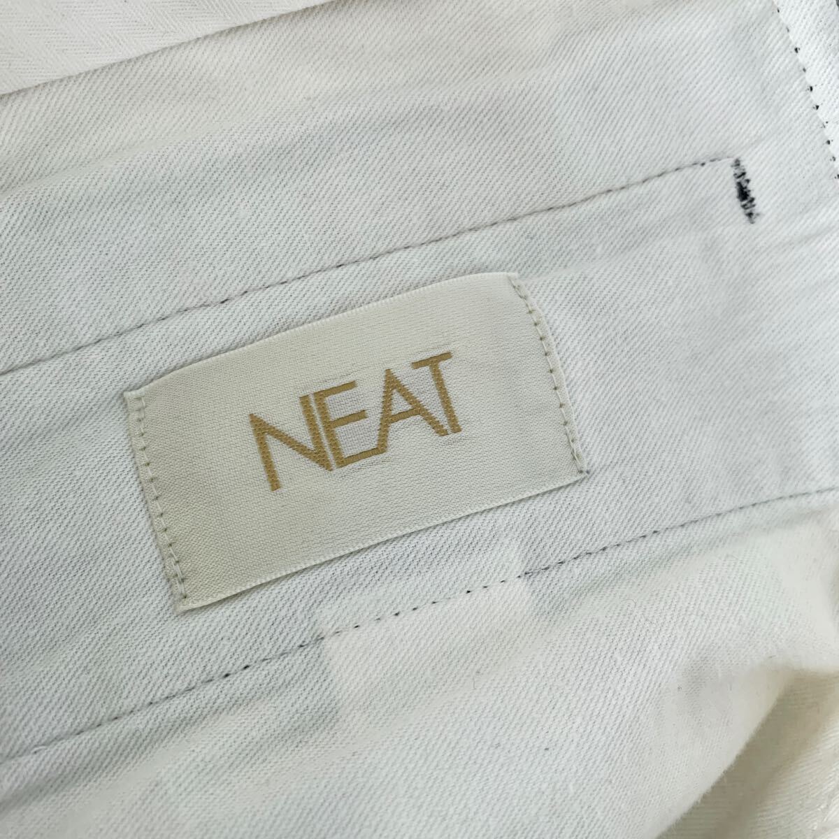 NEAT コットンピケ 2タックワイドパンツ ニート 44 S 黒 NEAT コットンピケ 2タックワイドパンツ ニート 44 S 黒