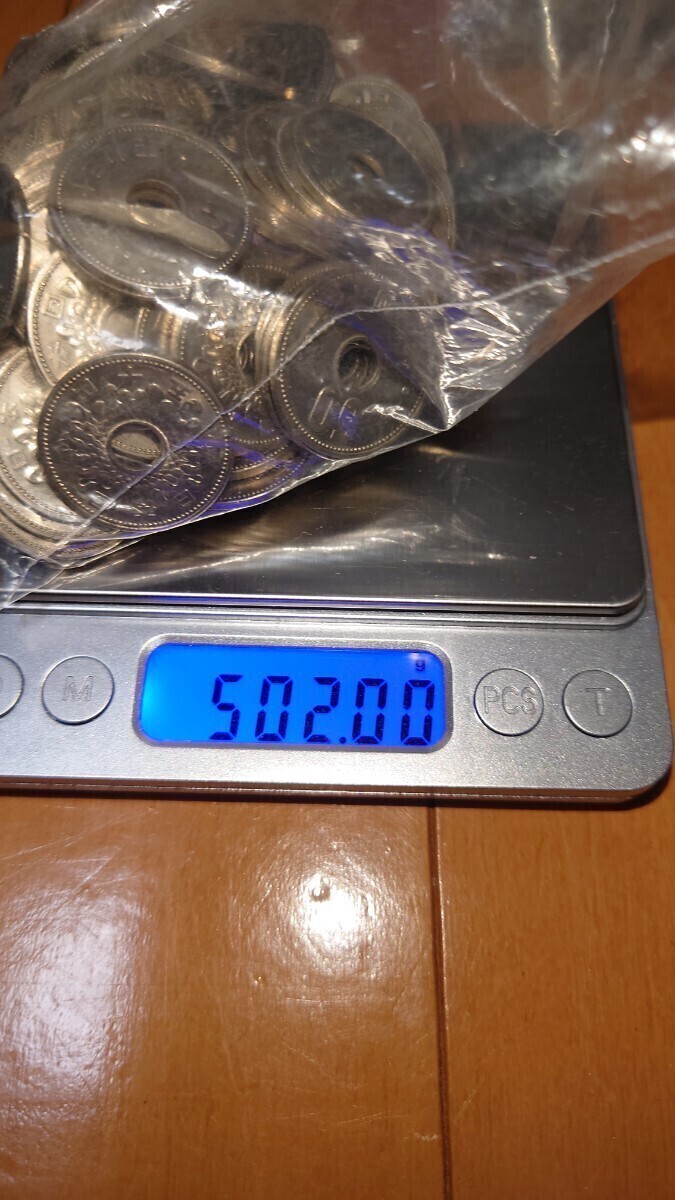 .50 иен никель . большой 50 иен монета 100 листов старая монета Япония старая монета 