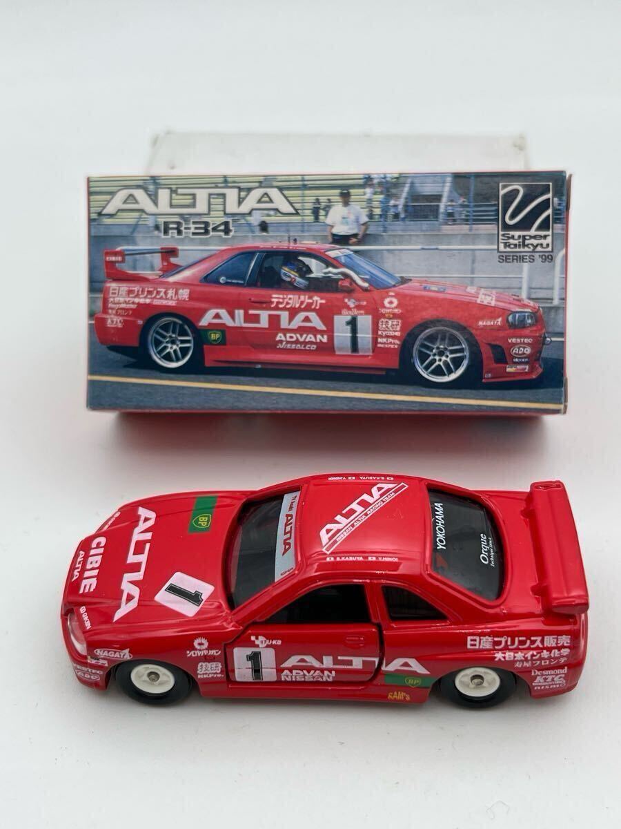 トミカ 日産 スカイライン GT-R R34 (中国製) アイアイアド トミカ 日産 スカイライン GT-R R34 (中国製) アイアイアド