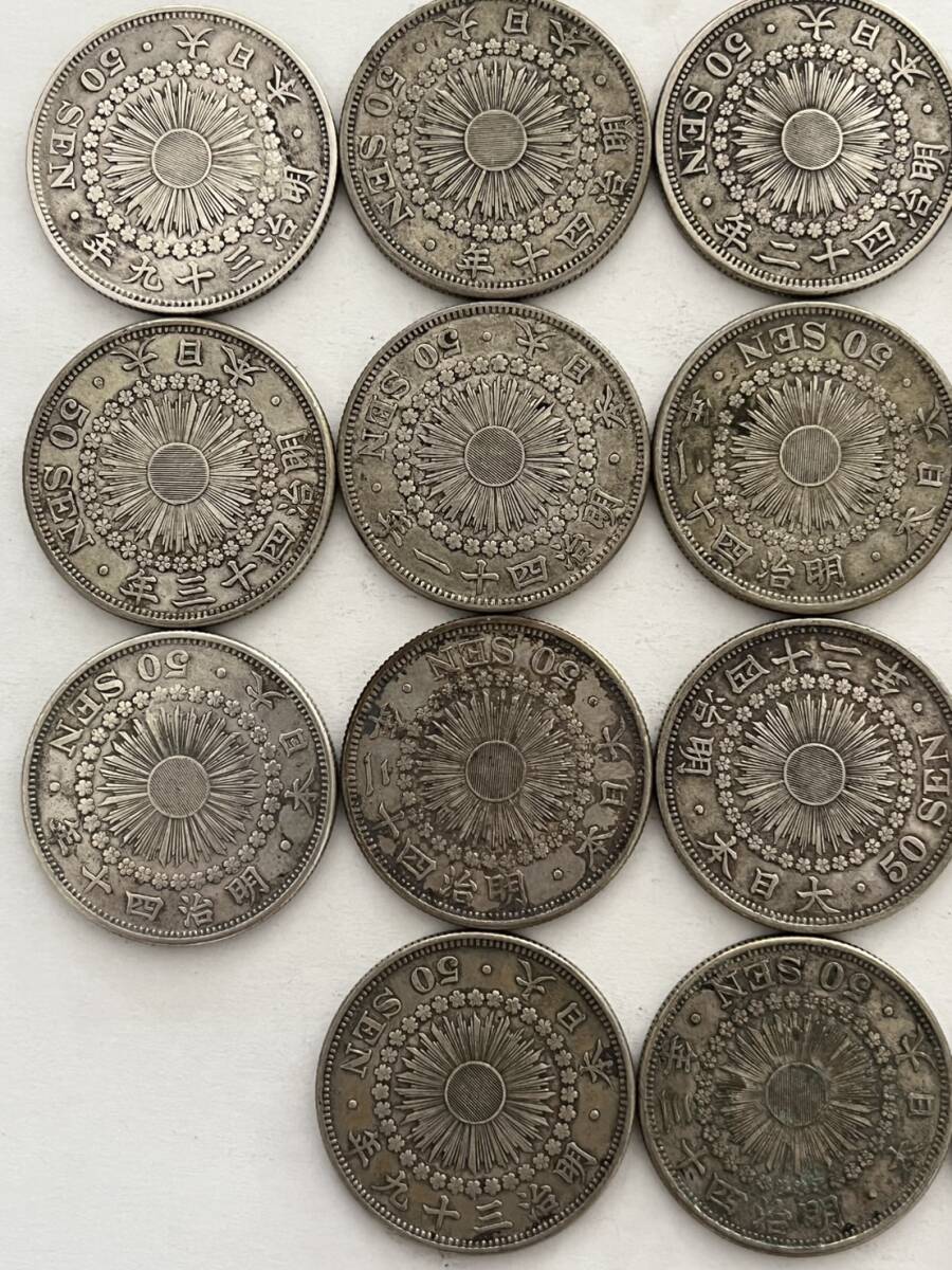 〇館100p 旭日50銭銀貨まとめて18枚 約182g 明治39年×4枚 40年×3 〇館100p 旭日50銭銀貨まとめて18枚 約182g 明治39年×4枚 40年×3