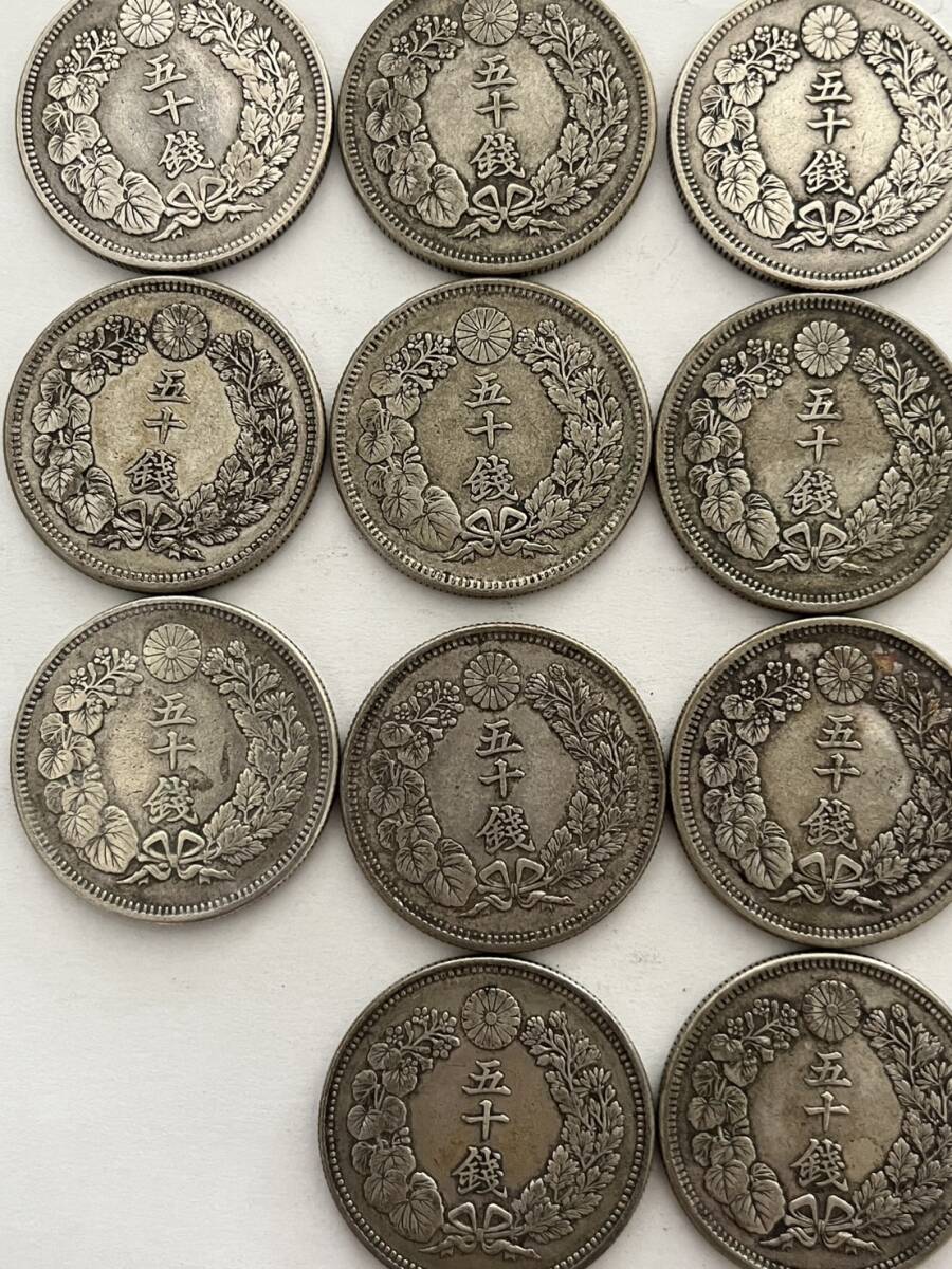 〇館100p 旭日50銭銀貨まとめて18枚 約182g 明治39年×4枚 40年×3 〇館100p 旭日50銭銀貨まとめて18枚 約182g 明治39年×4枚 40年×3