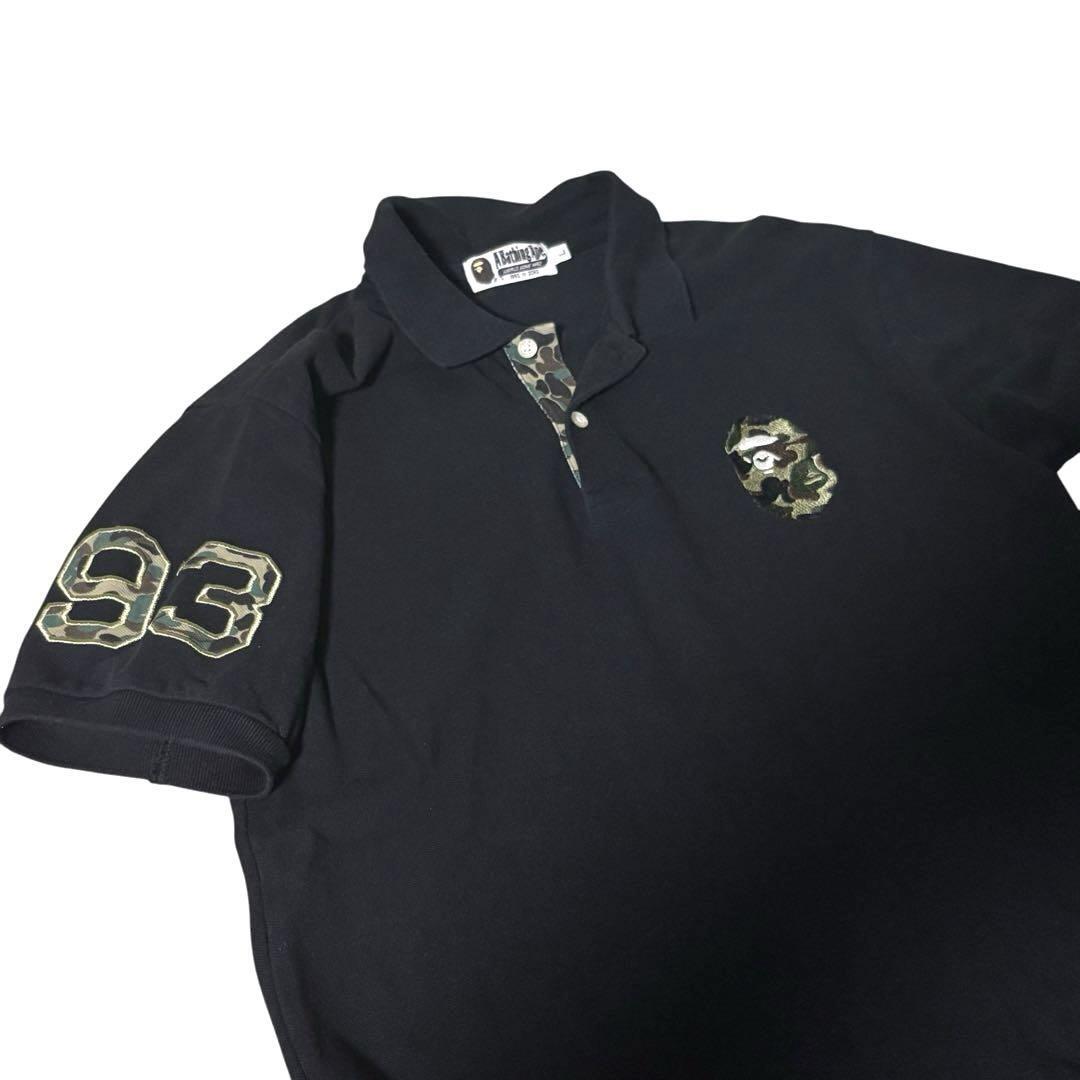 A BATHING APE アベイシングエイプ ポロシャツ ブラック×カモ L A BATHING APE アベイシングエイプ ポロシャツ ブラック×カモ L