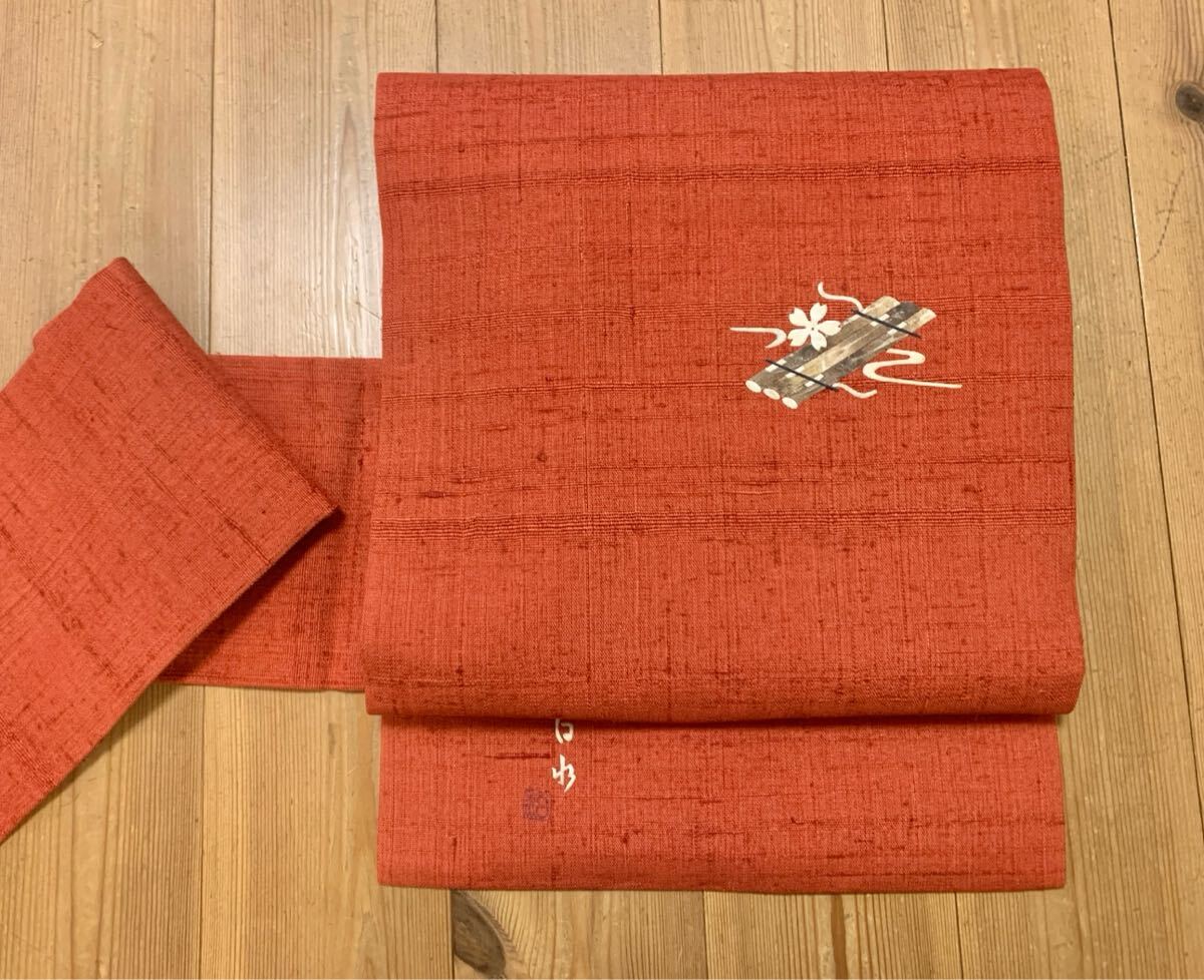 生紬 九寸名古屋帯 正絹 みのむし 新古品 桜 作家 赤色 朱色 生紬 九寸名古屋帯 正絹 みのむし 新古品 桜 作家 赤色 朱色