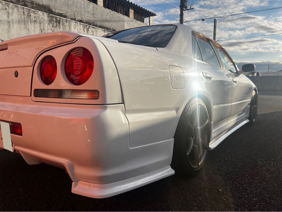  Nissan Skyline er34 hr34 4 двери meiku макияж MRer34 полный комплект передний носорог дориа East Bear -