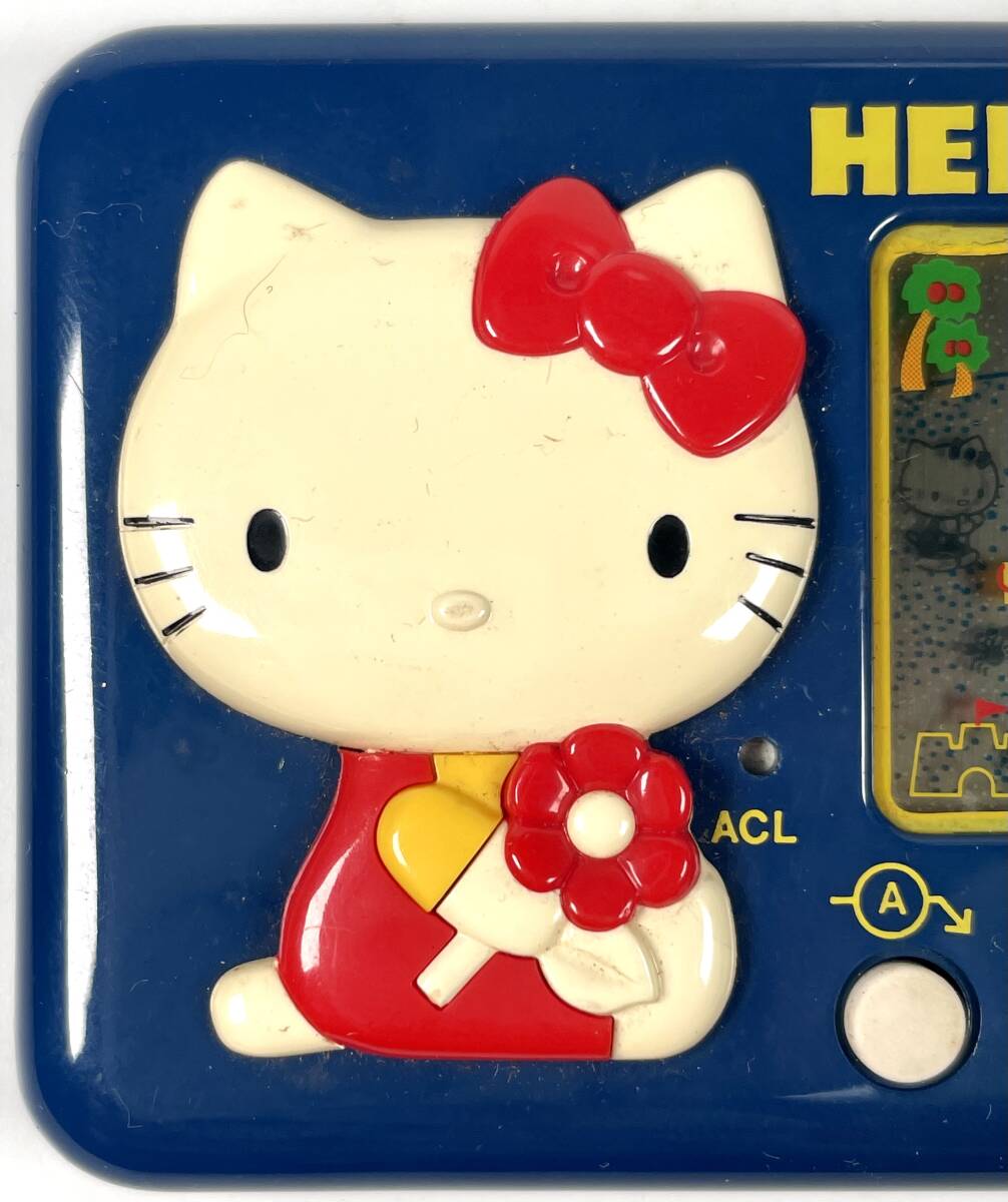 TOMY Hello Kitty [si- боковой Hori te-] жидкокристаллический игра ( Tommy /HELLO KITTY/SEASIDE HOLIDAY/LCD GAME/ вместе с ящиком / Showa Retro /JUNK)