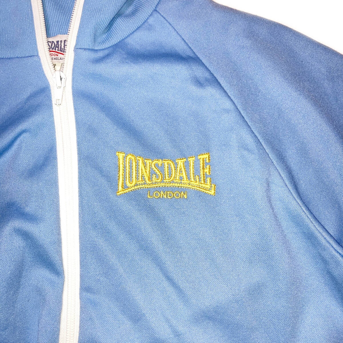 ロンズデール ビンテージ トラックジャケット 刺繍ロゴ 古着 M ライトブルー USED】 ロンズデール LONSDALE ビンテージ トラックジャケット