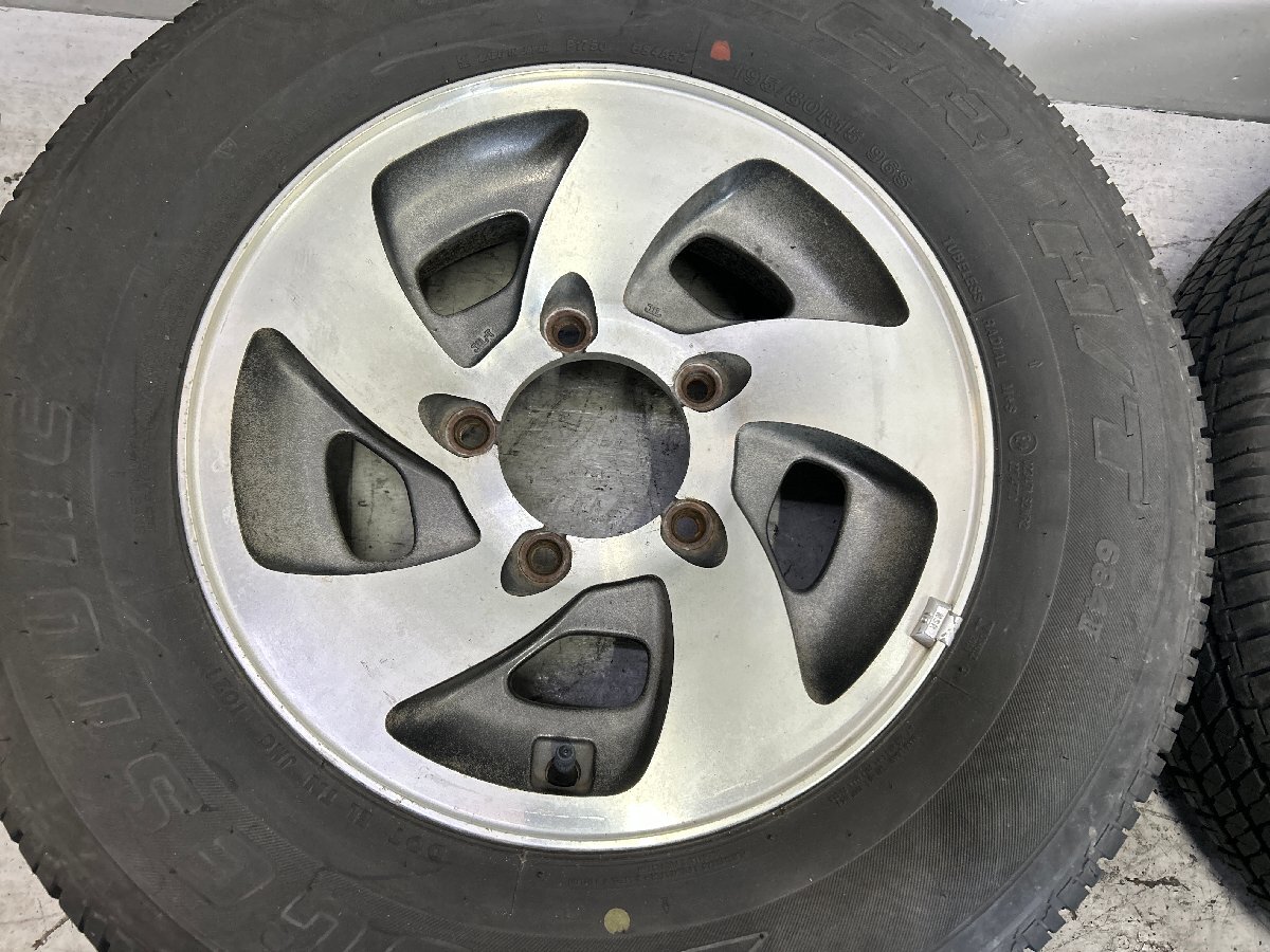 ジムニー JB23W ENKEI エンケイ 社外 5.5J+25 PCD139.7 5穴 ハブ徑108 ブリジストン DUELER H/T 195/80R15 2021年 バリ山 015201
