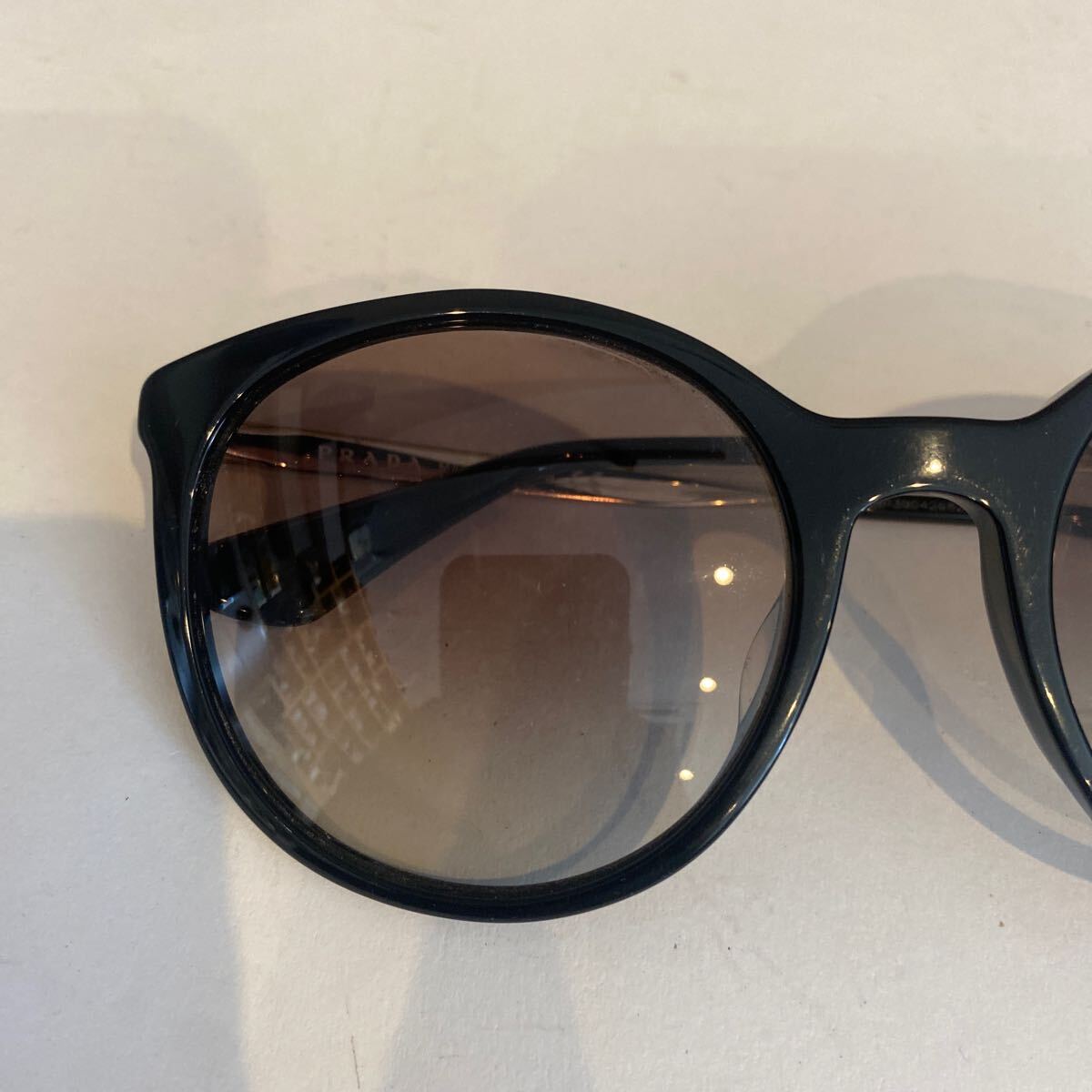 PRADA プラダ　 サングラス　55口21 