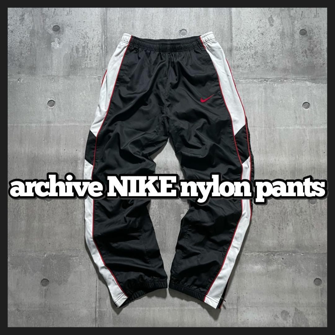 y2k archive OLD NIKE ナイロンパンツ サイドライン 裾ジップ y2k archive OLD NIKE ナイロンパンツ サイドライン 裾ジップ