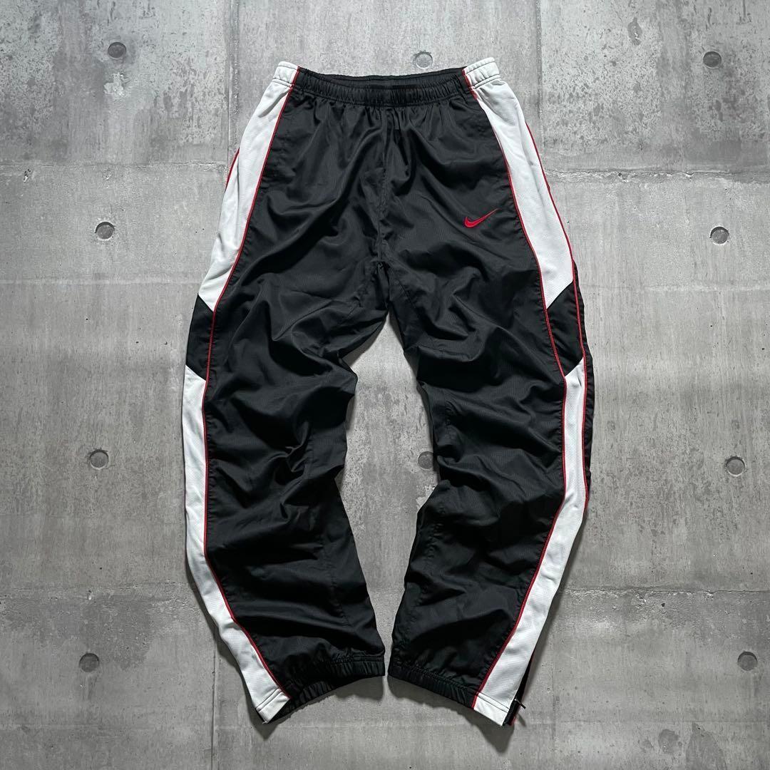 y2k archive OLD NIKE ナイロンパンツ サイドライン 裾ジップ y2k archive OLD NIKE ナイロンパンツ サイドライン 裾ジップ