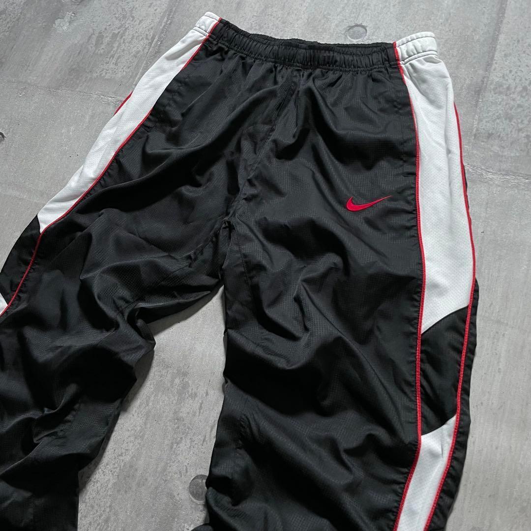 y2k archive OLD NIKE ナイロンパンツ サイドライン 裾ジップ y2k archive OLD NIKE ナイロンパンツ サイドライン 裾ジップ