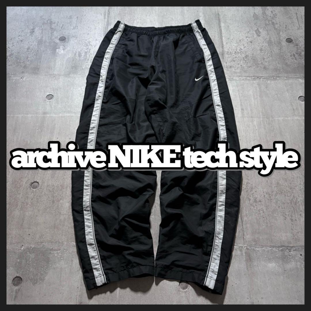 y2k NIKE ナイロントラックパンツ サイドライン 裾ジップ y2k NIKE ナイロントラックパンツ サイドライン 裾ジップ