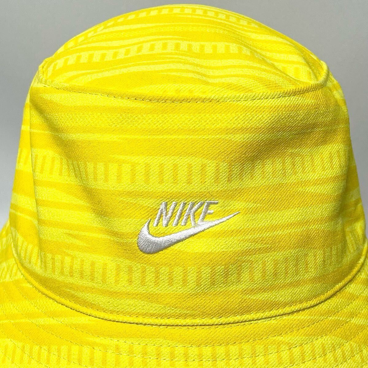 【新品】定価 5,280円 NIKE ナイキ限定モデルSUNSET PACK総柄バケットハット イエロー size M/L 58cm 男女兼用 コーディネートのポイントに_画像4