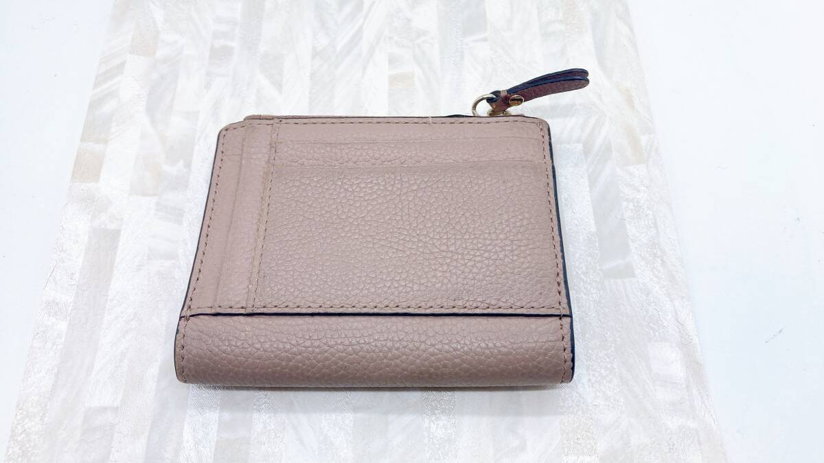 MICHAEL KORS マイケルコース 二つ折り財布 ピンク 中古 送料 MICHAEL KORS マイケルコース 二つ折り財布 ピンク 中古 送料